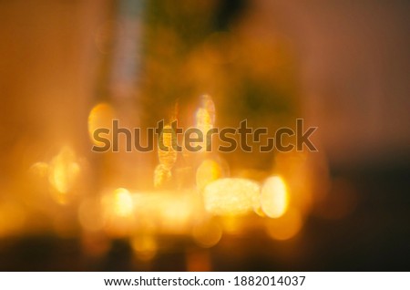 Christmas background. Festive abstract background with bokeh defocused lights. Home background for text or postcards.