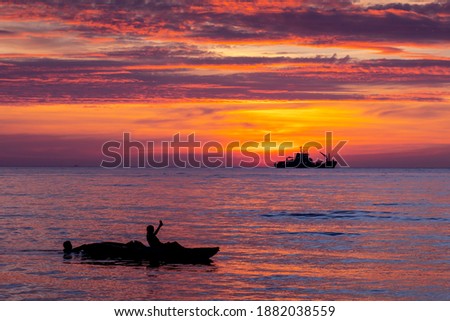 ship silhouette in sunset light  background