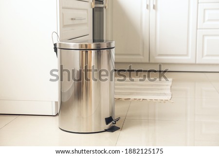 Clean trash bin in modern kitchen Royalty-Free Stock Photo #1882125175