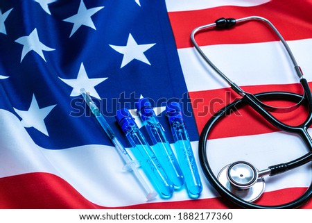 Disease outbreak. Medical syringe with needle for protection flu virus and coronavirus. Covid vaccine usa flag of america. Syringe, medical injection.
