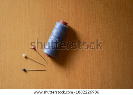 The Tailor tools, a Thread and three Pins
