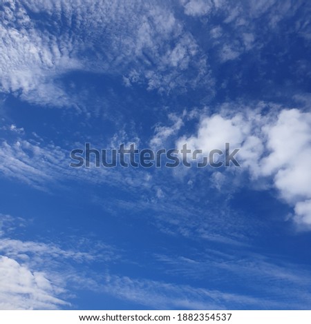 Blue sky landscape background with white clouds