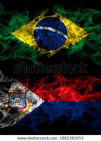 Brazil, Brazilian vs Netherlands, Dutch, Holland, Sint Maarten smoky mystic flags placed side by side. Thick colored silky abstract smoke flags.
