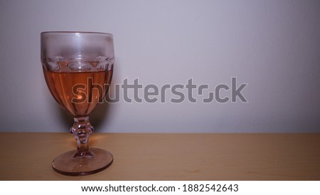 bottle of wine standing on table white background