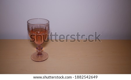bottle of wine standing on table white background