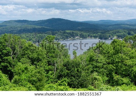 A view of Bantam Lake from atop Apple Hill in Morris Connecticut in Litchfield County New Engalnd.  Royalty-Free Stock Photo #1882551367