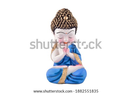 Ceramic buddha showpiece isolated on white background with clipping path Royalty-Free Stock Photo #1882551835