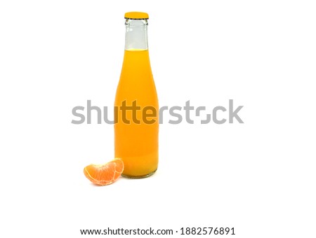 Bottle of fresh natural orange juice on a white background, suitable for presentations (focus selection).