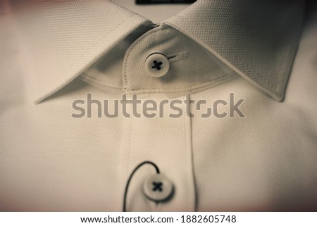 white shirt with collar and button
