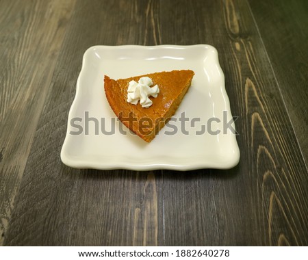 A slice of crustless pumpkin pie.