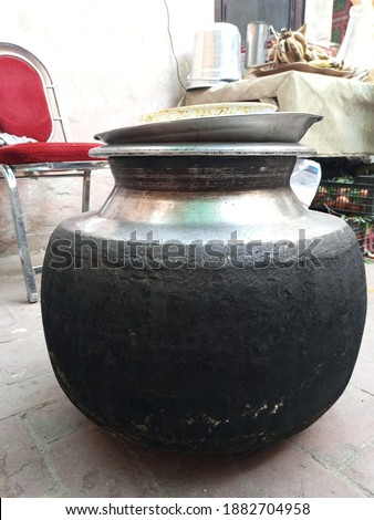 A big cauldron on ground for cooking food on large scale 