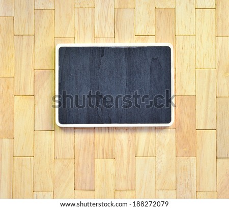 blackboard on wood plank brown texture background