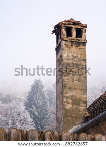 Old chimney made of stone and bricks built in the year 1900, in Sighisoara Romania.