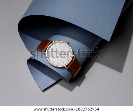 Advertising a beautiful watch with a leather strap