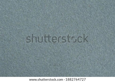 Grey fur leather hairy texture background. Image photo