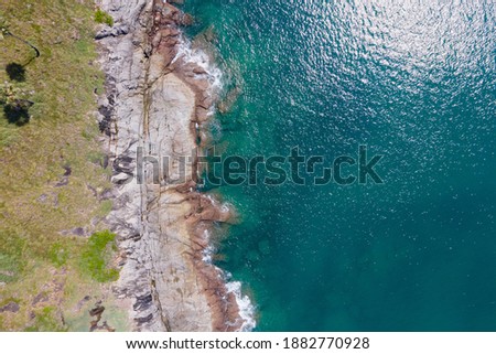Top view Aerial view of drone Turquoise beach sea sand copy space. travel tourism concept. Seawater wave and surf on a sandy beach. Beach space area background. Nature and travel