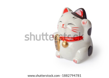 Maneki neko lucky cat show text on hand meaning rich on white background, select focus Royalty-Free Stock Photo #1882794781