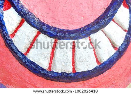 A smile saw teeth made of cement.
