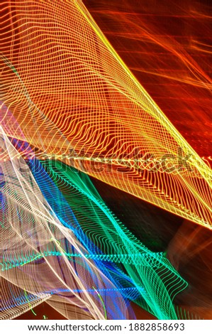 
Colored light paths with movement effect, long exposure or slow shutter image