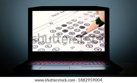 online exam concept photo via computer
