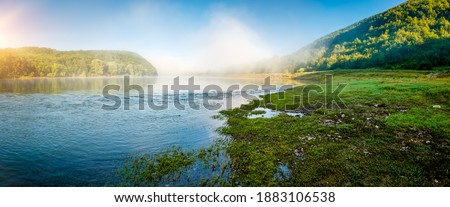 Calm morning scene in summer on the Dniester river. Location place Dnister canyon of Ukraine, Europe. Picturesque photo wallpaper. Nature photography. World landmarks. Discover the beauty of earth.
