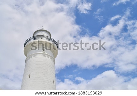 macquarie lighthouse, a white hertiage listed building in the sunny day