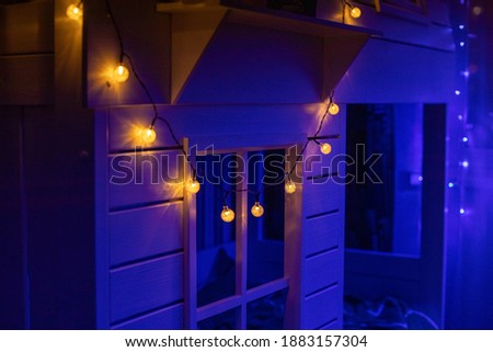 Children's room decorated with lights Royalty-Free Stock Photo #1883157304