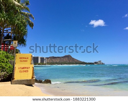 Waikiki Beach with Diamond Head volcanic tuff cone in the background on the Hawaiian island of Oʻahu.