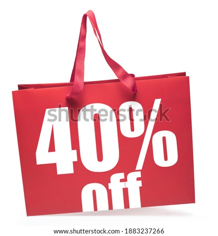 Red shopping bag with 20% off sale message and handles.Clipping path