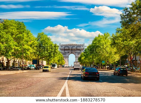 Road of Champs Elysee leading to Arc de Triomphe in Paris, France Royalty-Free Stock Photo #1883278570
