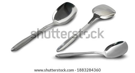Stainless steel big spoon  on a white background,with clipping path Royalty-Free Stock Photo #1883284360