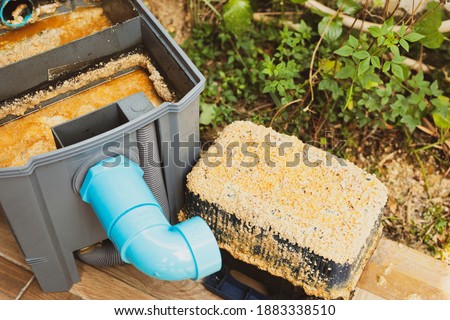 Grease traps box in the house, fats oils and grease.Concept waste water treatment Royalty-Free Stock Photo #1883338510