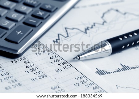 Financial accounting stock market graphs analysis  Royalty-Free Stock Photo #188334569