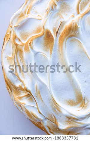 top view of lemon pie with burnt meringue