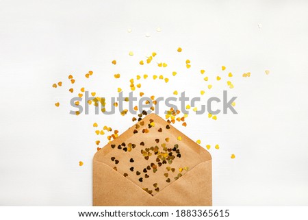Envelope with gold glitter heartbeats, Valentine day concept flat lay