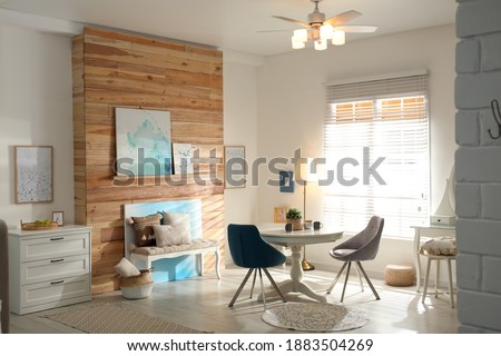 Stylish room interior with modern ceiling fan Royalty-Free Stock Photo #1883504269