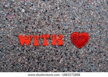 The words with love on a shiny glitter background