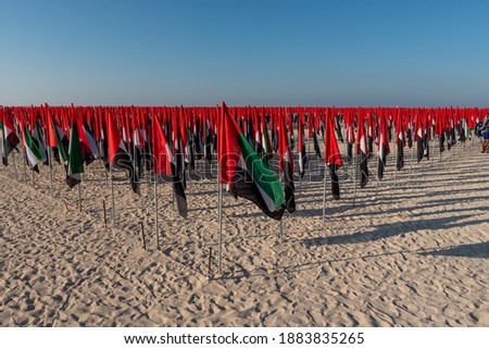 UAE Flag Day celebration with set up of Flag Garden, located at Kite Beach, Dubai. 4000 flags were used  to make portraits of leaders. Shot at daytime. 