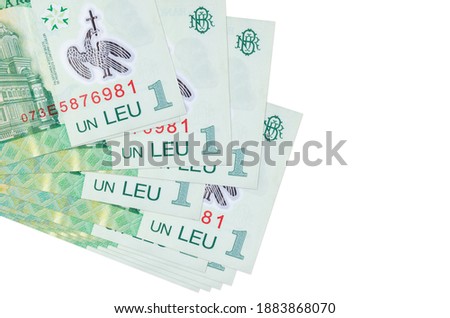 1 Romanian leu bills lies in small bunch or pack isolated on white. Mockup with copy space. Business and currency exchange concept