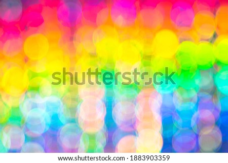 Bokeh rainbow colorful abstract blur holiday background defocus.