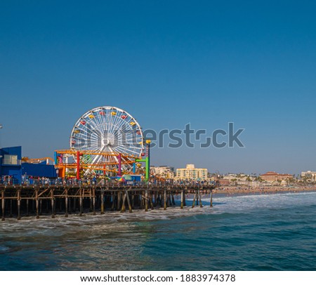 Wide view of Santa Monica pier Ferris Wheel in California 