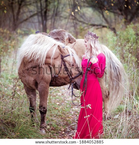 Beautiful woman, blonde ride light gray horse. Princess in fairy tale. Fantasy autumn