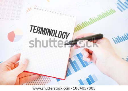 Notepad with text Terminology. Diagram and white background