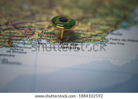 Rio de Janeiro pinned on a map with the flag of Brazil
