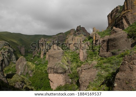 Jurassic landscape. Panorama view of the mountains, green forest and rock formations called Los Terrones, in Cordoba, Argentina.
