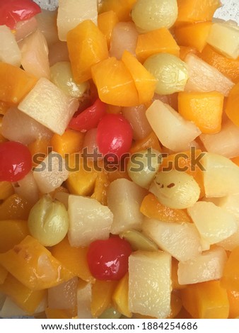 close up photo of fruit cocktail slices 