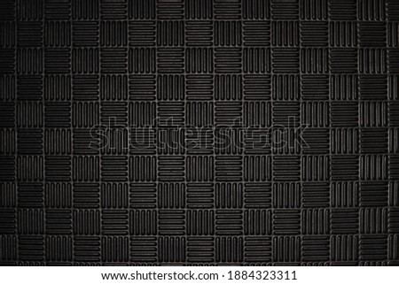 Black rubber Mat, background, texture close-up Royalty-Free Stock Photo #1884323311