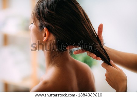 Ayurveda Essential Oil Treatment for Healthy Hair Royalty-Free Stock Photo #1884369610