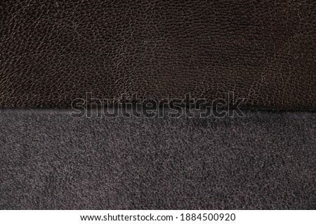 Black genuine leather texture. Leather and suede background. Close-up.