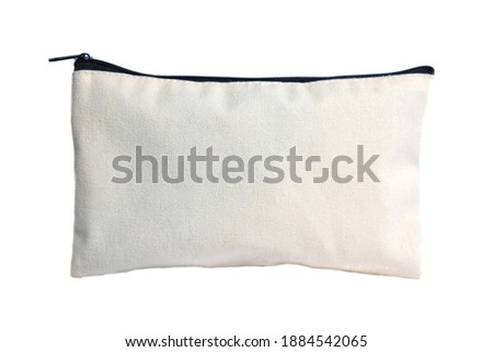 plain zipper bag for pencil case and cosmetic alphabet zipper bag over white background  Royalty-Free Stock Photo #1884542065